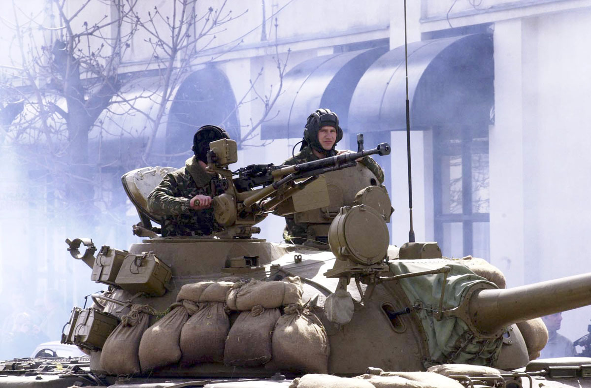 A Macedonian T-55 tank in the streets of Tetovo during a large offensive against ethnic Albanian rebels.